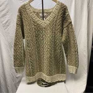 The limited hand knit, wool blend cable boho chic, camel mid thigh sweater. P/S